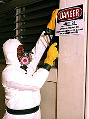 Putting up an asbestos warning sign